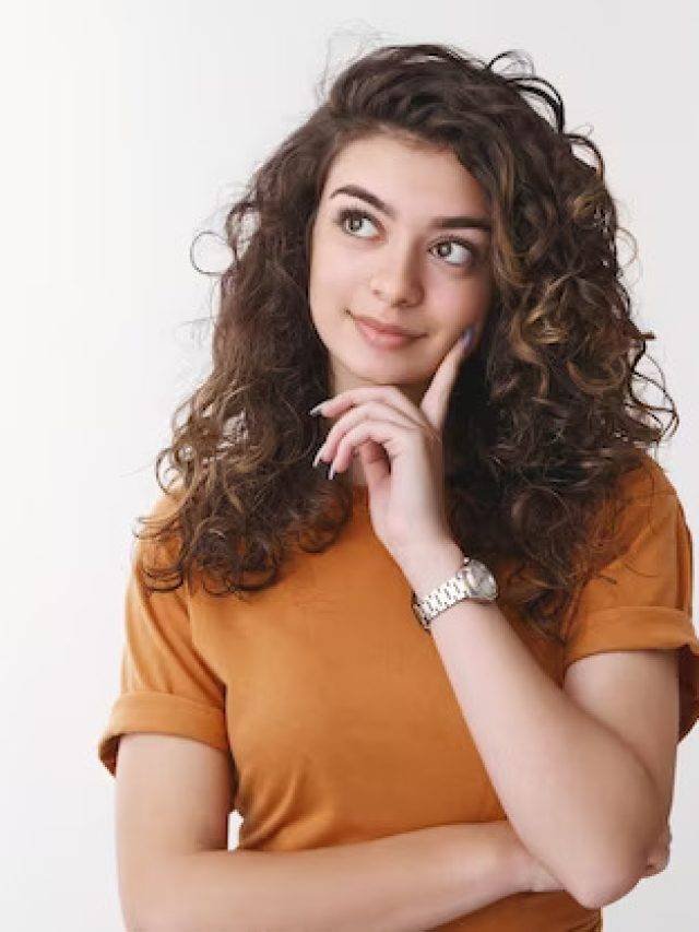 girl-deciding-what-product-better-look-up-thoughtful-touch-chin-thinking-smiling-shopping-alone-making-choice-considering-proposals_176420-44746